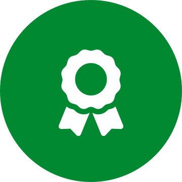 White award icon on a round green background