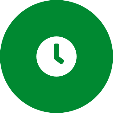 White clock icon on a round green background