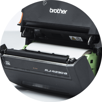 Brother RJ mobile printer open showing roll of label