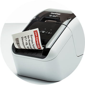 Brother QL desktop label printer with red and black label