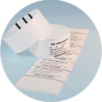 Two printed wristbands with line of printed labels